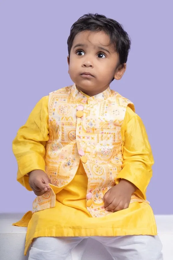 Vibrant yellow kurta set with an embroidered Peach Nehru jacket, paired with classic white churidar pants for a festive look